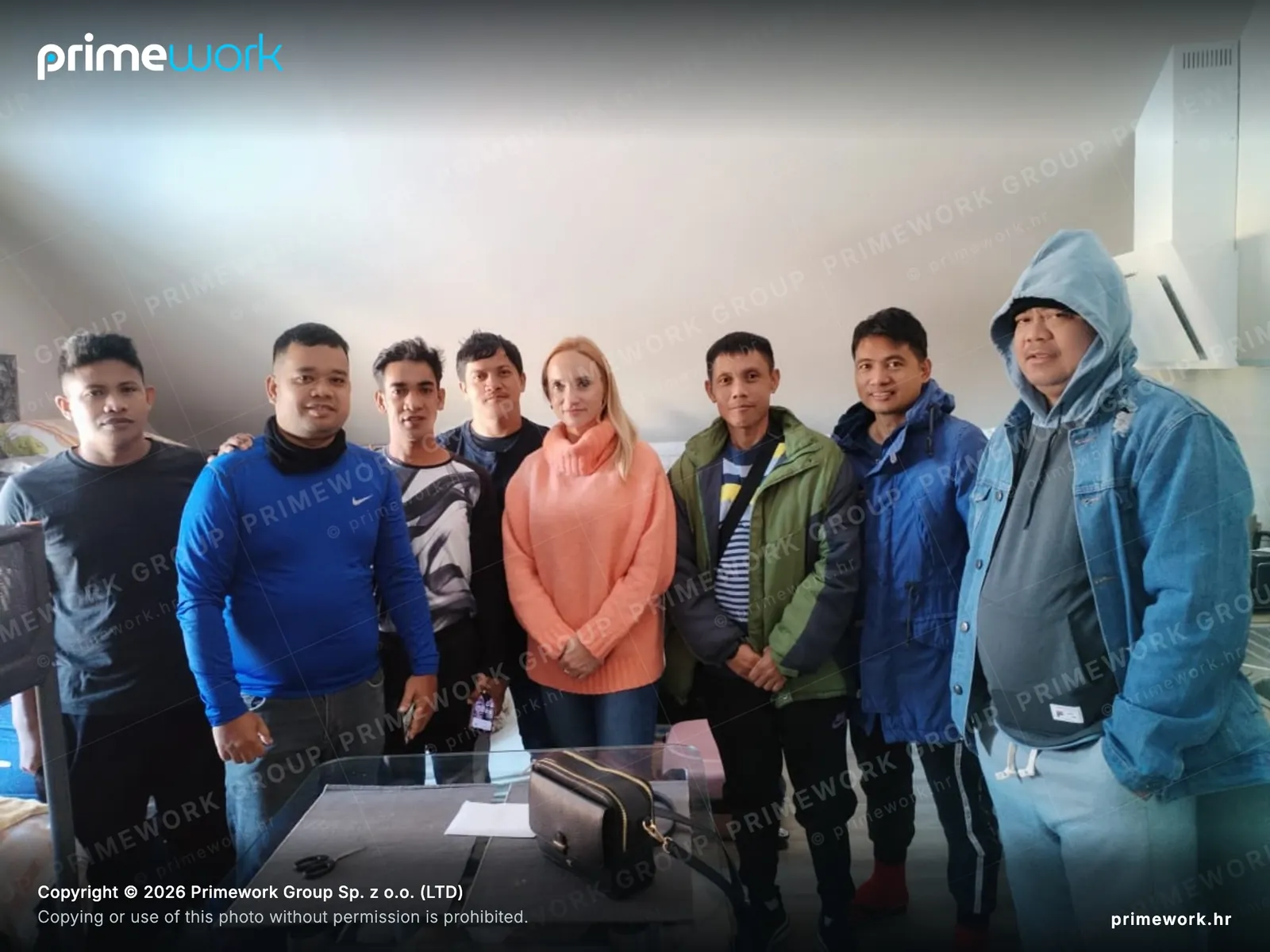 A Primework coordinator with workers during an accommodation visit