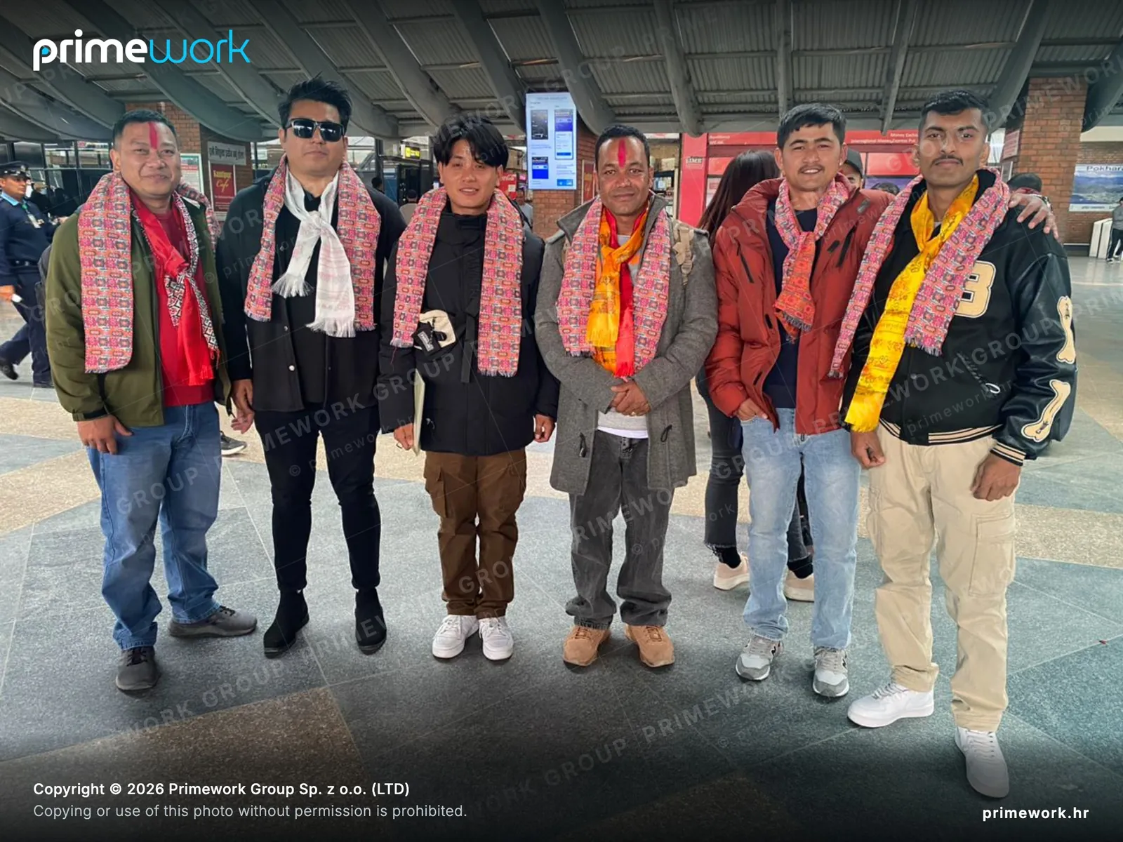 A group of workers from Nepal before departing Kathmandu